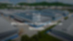 Photograph of solar panels on a rooftop with text overlay "Why Commercial Buildings Should Go Renewable"