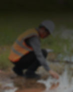 Environmental scientists taking a soil sample