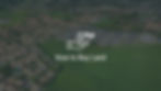 Aerial photograph of land with a neighborhood of houses