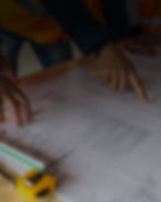 Land surveyor looking at a white paper map